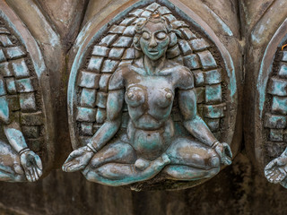 Meditating figure - a part of a buddah statue in Berlin-Mitte