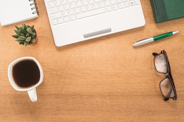  Office table with cup of coffee 