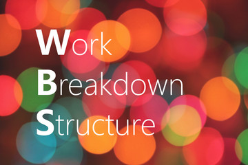 WBS (Work Breakdown Structure) acronym on colorful bokeh background