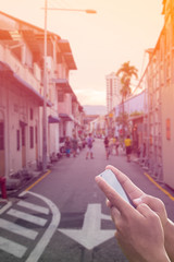 Fototapeta premium hold telephone find gps in travel on city