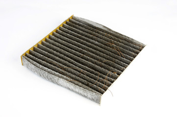 dirty cabin air filter isolated on white background