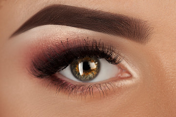 Obraz premium Close up of eye with make up