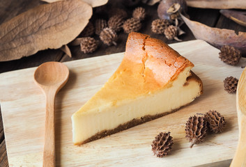 New York cheese cake on wooden table