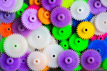 Dirty multicolor plastic gear for background