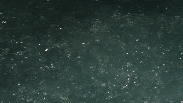 Sparkling bubbles in flowing water