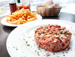 tasty Steak tartare (Raw beef) - classic steak tartare on white