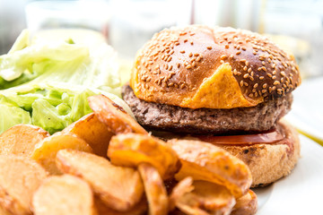Cheese burger - American cheese burger with fresh salad