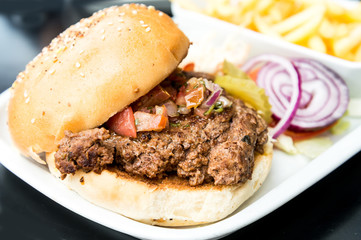 Cheese burger - American cheese burger with fresh salad