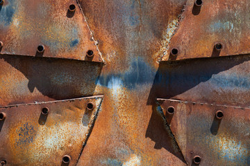 Rusty metal cross background
