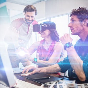 Colleagues using technology
