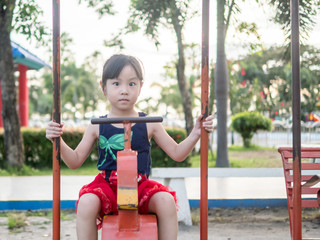 Fototapeta na wymiar asian baby child playing on playground