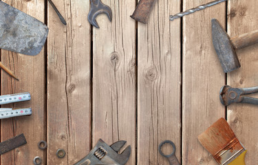 Old construction tools with free space for text. Hammer, chisel, brush, paint, wood plane, ruler,...