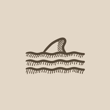 Dorsal shark fin above water sketch icon.