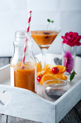 tropical smoothie in glass bottles
