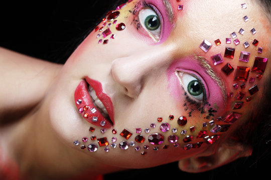 woman with bright artistic make-up
