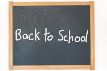 ein Text zur Einschulung steht auf einer Tafel