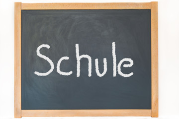 Obraz premium das Wort Schule steht auf einer Tafel
