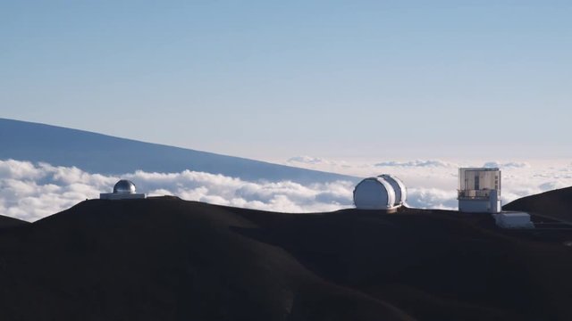 Past Mauna Loa Observatory with clouds in valley. Shot in 2010.