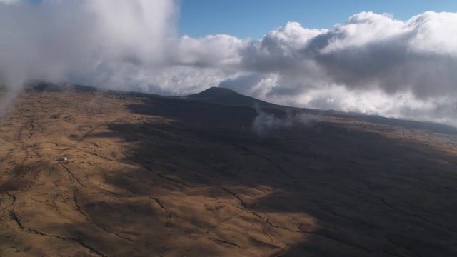 High up slope of Mauna Loa in cloud shadow. Shot in 2010.