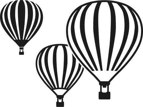 Three flying hot air balloons