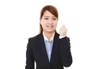 ガッツポーズのビジネスウーマン