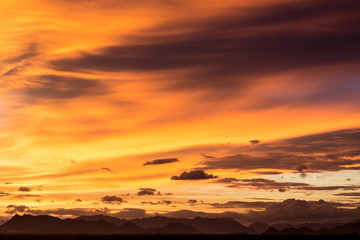 Obraz premium Silhouettes of mountain on sunset