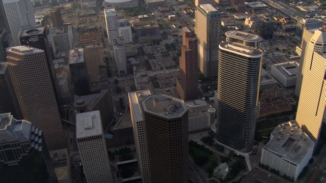 Flight over downtown Houston skyscrapers in afternoon light. Shot in 2007.