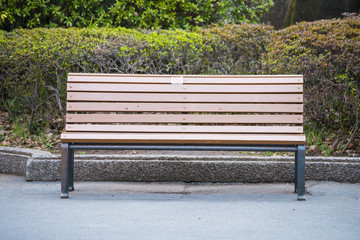 brown bench in the park