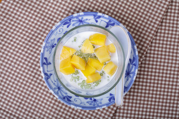 Thai dessert of sago with coconut milk and mango