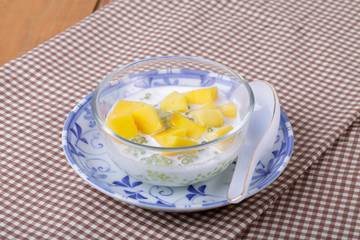 Thai dessert of sago with coconut milk and mango
