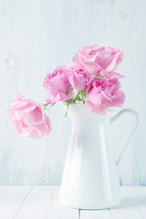 Pink roses in jug