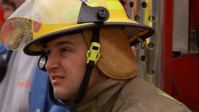Close-up face of fireman resting