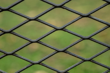 Close up Steel mesh background. (Selective focus)