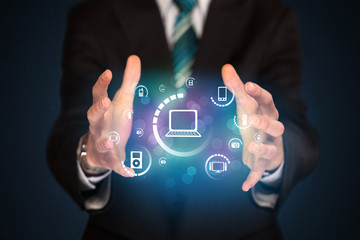 holding digital media icons