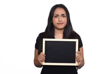 Latin woman holding chalkboard.