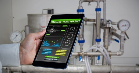 Composite image of man using tablet pc 