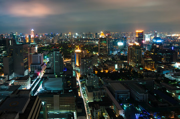 Fototapeta na wymiar Aerial view of Bangkok city at night. View from above of modern Asian megalopolis cityscape at night