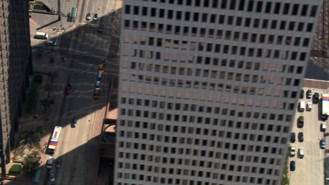 Flight through downtown Houston, with steep look down into streets. Shot in 2008.