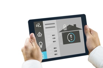 Composite image of man using tablet pc