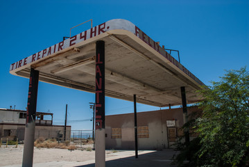 An abandoned garage and gas station near Salton Sea, a shallow, saline, endorheic rift lake located directly on the San Andreas Fault