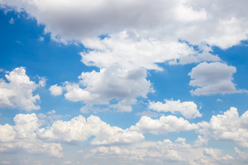 blue sky background with tiny clouds