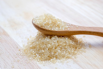brown sugar heap on wooden table