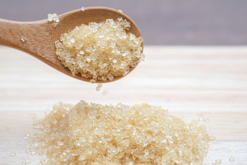 brown sugar heap on wooden table