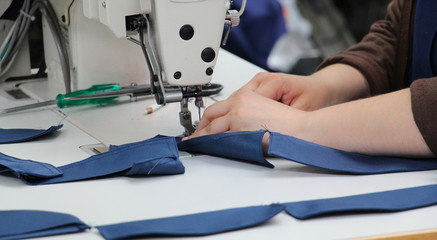 Female worker on textile production industry