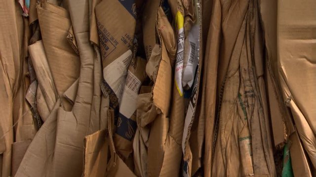 Bundled cardboard waiting to be recycled