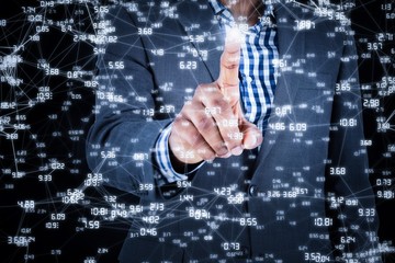 Composite image of focused businessman pointing