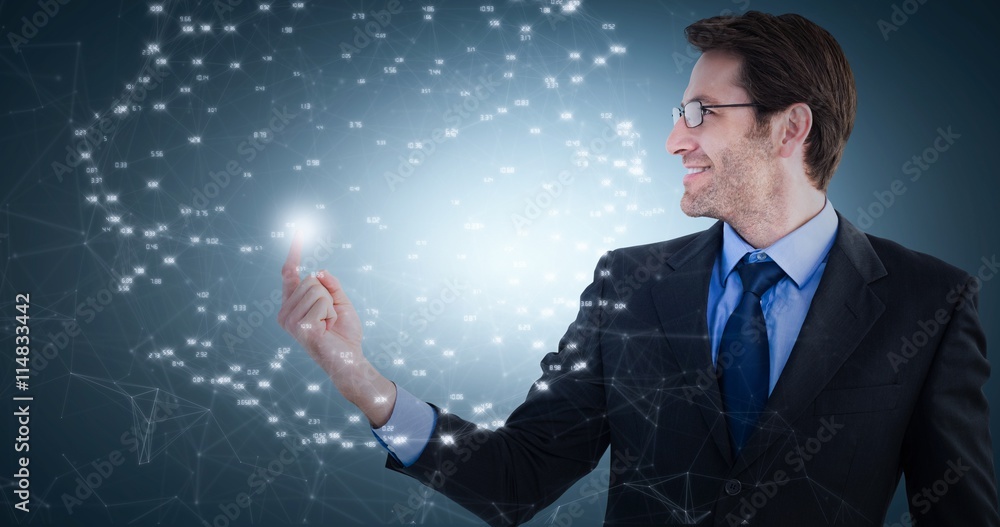 Poster composite image of smiling businessman pointing at a copy space