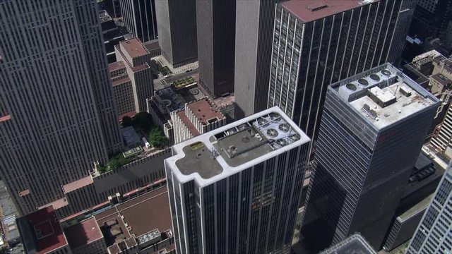 Diagonal flight above Manhattan buildings toward Times Square. Shot in 2006.