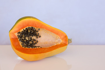 Fresh paw paw / papaya fruit with seeds