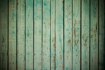Fototapeta na wymiar old cracked painted planks surface